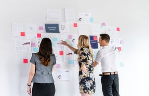 Team - Business people planning a marketing strategy. iStock-2157230437