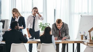 group-of-businesspeople-having-conversation_1920x1080