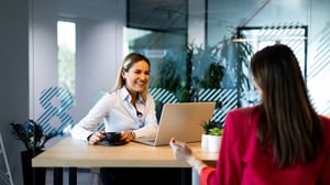 two-women-collaborating_1920x1080