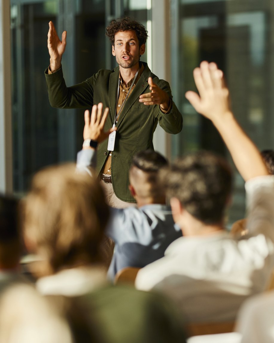 Engaging seminar in the office iStock-2164304818