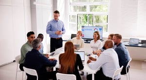Home_ Company Inside Meeting In Office Boardroom_iStock-2153480581