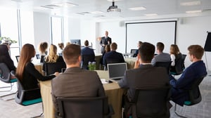 businessman making presentation at conference_1920x1080