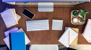 desk-with-computer-books-and-notepads_1920x1080