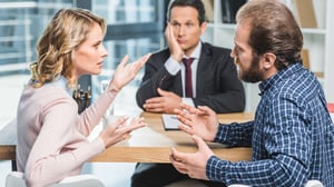 side view of people arguing at workplace_1920x1080