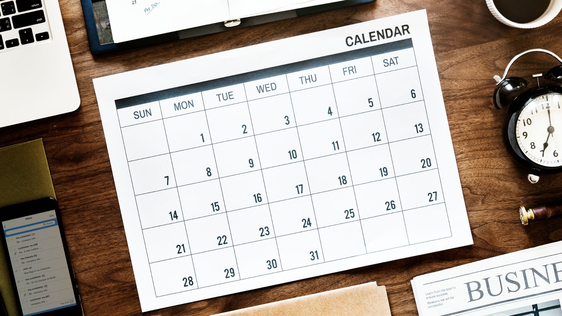 flat-lay-of-business-agenda_1920x1080