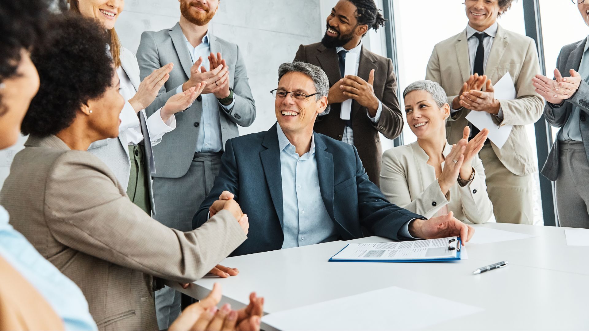 young-business-people-meeting-office-handshake_1920x1080